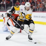 Apr 29, 2026; Philadelphia, Pennsylvania, USA; Pittsburgh Penguins right wing Anthony Mantha (39) reaches for the puck against the Philadelphia Flyers in the second period in game six of the first round of the 2026 Stanley Cup Playoffs at Xfinity Mobile Arena.