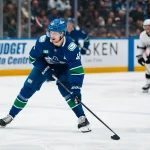 Apr 14, 2026; Vancouver, British Columbia, CAN; Vancouver Canucks forward Elias Pettersson (40) handles the puck against the Los Angeles Kings in the second period at Rogers Arena.