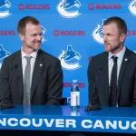 May 14, 2026; Vancouver, BC, Canada; The Vancouver Canucks promoted Henrik Sedin (left) and his twin brother Daniel Sedin (right) to co-presidents during a press conference at Rogers Arena.