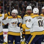 Jan 27, 2026; Boston, Massachusetts, USA; Nashville Predators defenseman Roman Josi (59) is surrounded by teammates (left to right) left wing Filip Forsberg (9), center Jonathan Marchessault (81), center Steven Stamkos (91) and center Ryan O'Reilly (90) after scoring on the power play against the Boston Bruins during the second period at TD Garden.