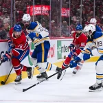 16 mai 2026; Montréal, Québec, Canada; Le défenseur des Sabres de Buffalo, Mattias Samuelsson (23), défend la rondelle face à l\'ailier droit des Canadiens de Montréal, Zachary Bolduc (76), durant la troisième période du sixième match de la deuxième ronde des séries éliminatoires de la Coupe Stanley 2026 au Centre Bell.