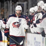 Feb 26, 2026; Boston, Massachusetts, USA; Columbus Blue Jackets center Adam Fantilli (19) celebrates a goal against the Boston Bruins with his bench during the third period at TD Garden.