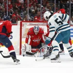Oct 29, 2023; Washington, District of Columbia, USA; Washington Capitals goaltender Darcy Kuemper (35) makes a save against San Jose Sharks right wing Givani Smith (54) during the second period at Capital One Arena.