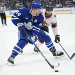 Dec 27, 2025; Toronto, Ontario, CAN; Toronto Maple Leafs defenseman Morgan Rielly (44) goes to pass the puck to Toronto Maple Leafs forward Matthew Knies (not pictured) before scoring against the Ottawa Senators during the third period at Scotiabank Arena.
