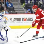 Dec 14, 2024; Detroit, Michigan, USA; Detroit Red Wings right wing Patrick Kane (88) skates in on Toronto Maple Leafs goaltender Joseph Woll (60) in the second period at Little Caesars Arena.