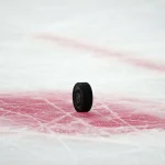 Oct 28, 2021; Los Angeles, California, USA; A detailed view of a NHL puck with the LA Kings logo in the first period of the game between the Winnipeg Jets and the Los Angeles Kings at Staples Center.