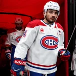 May 29, 2026; Raleigh, North Carolina, USA; Montreal Canadiens center Nick Suzuki (14) walks to the ice for warmups before game five of the Eastern Conference Final of the 2026 Stanley Cup Playoffs against the Carolina Hurricanes at Lenovo Center.