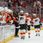 May 4, 2026; Raleigh, North Carolina, USA; Philadelphia Flyers center Sean Couturier (14) celebrates his goal against the Carolina Hurricanes during the first period in game two of the second round of the 2026 Stanley Cup Playoffs at Lenovo Center.