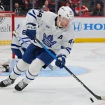 Feb 26, 2026; Sunrise, Florida, USA; Toronto Maple Leafs defenseman Morgan Rielly (44) moves the puck against the Florida Panthers during the third period at Amerant Bank Arena.