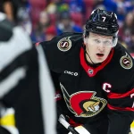 Dec 4, 2025; Ottawa, Ontario, CAN; Ottawa Senators left wing Brady Tkachuk (7) waits for a face-off against the New York Rangersduring the first period at Canadian Tire Centre.