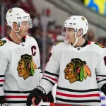 Oct 26, 2019; Raleigh, NC, USA; Chicago Blackhawks center Jonathan Toews (19) and right wing Patrick Kane (88) talk against the Carolina Hurricanes at PNC Arena. The Carolina Hurricanes defeated the Chicago Blackhawks 4-0.