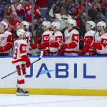 Apr 13, 2026; Tampa, Florida, USA; Detroit Red Wings right wing Alex DeBrincat (93) reacts after scoring a goal against the Tampa Bay Lightning in the third period at Benchmark International Arena.