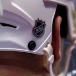 Feb 7, 2015; Saint Paul, MN, USA; The NHL logo on the back of a Colorado Avalanche helmet in a game against the Minnesota Wild at Xcel Energy Center. The Minnesota Wild beat the Colorado Avalanche 1-0.
