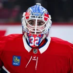 Apr 5, 2026; Montreal, Quebec, CAN; Montreal Canadiens goalie Jacob Fowler (32) looks on against the New Jersey Devils during the second period at Bell Centre.
