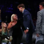 Jun 26, 2026; Buffalo, New York, USA; Adam Novotny reacts after being selected with the twenty fourth pick in the first round of the 2026 NHL Draft by the Vancouver Canucks at KeyBank Center.