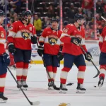 Feb 26, 2026; Sunrise, Florida, USA; Florida Panthers left wing Brad Marchand (63) and defenseman Aaron Ekblad (5) celebrate with teammates after the game against the Toronto Maple Leafs at Amerant Bank Arena.