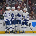 Apr 4, 2026; Los Angeles, California, USA; Toronto Maple Leafs celebrate the short handed goal scored by center Steven Lorentz (18) against the Los Angeles Kings during the first period at Crypto.com Arena.