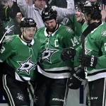 Apr 21, 2025; Dallas, Texas, USA; Dallas Stars center Wyatt Johnston (53) and right wing Evgenii Dadonov (63) and left wing Jamie Benn (14) and defenseman Alexander Petrovic (28) celebrate a goal against the Colorado Avalanche in game two of the first round of the 2025 Stanley Cup Playoffs at American Airlines Center.