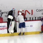 Kevin Mandolese, avec les joueurs du Canadien de Montréal en direct de Brossard.