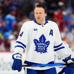 Jan 12, 2026; Denver, Colorado, USA; Toronto Maple Leafs defenseman Morgan Rielly (44) before the game against the Colorado Avalanche at Ball Arena.