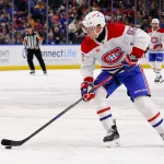 Mar 1, 2025; Buffalo, New York, USA; Montreal Canadiens right wing Patrik Laine (92) looks to take a shot on goal during the first period against the Buffalo Sabres at KeyBank Center.