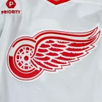 Jan 10, 2026; Montreal, Quebec, CAN; View of a Detroit Red Wings logo on a jersey worn by a member of the team during warm-up before the game against the Montreal Canadiens at Bell Centre.