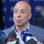 Kent Hughes a réussi un grand coup en attaque Kent Hughes a réussi un grand coup en attaque