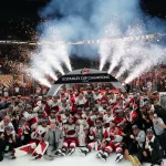 Jun 14, 2026; Las Vegas, Nevada, USA; The Carolina Hurricanes pose with the the Stanley Cup after defeating Vegas Golden Knights in game six of the 2026 Stanley Cup Final at T-Mobile Arena.