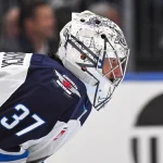 May 2, 2025; St. Louis, Missouri, USA; Winnipeg Jets goaltender Connor Hellebuyck (37) looks on during the second period in game six of the first round of the 2025 Stanley Cup Playoffs against the St. Louis Blues at Enterprise Center.