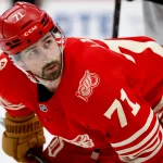 Mar 28, 2026; Detroit, Michigan, USA; Detroit Red Wings center Dylan Larkin (71) gets set to face off in the second period against the Philadelphia Flyers at Little Caesars Arena. :