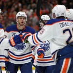 Apr 24, 2026; Anaheim, California, USA; Edmonton Oilers center Connor McDavid (second from left) celebrates with teammates after scoring a a power play goal during the third period against the Anaheim Ducks in game three of the first round of the 2026 Stanley Cup Playoffs at Honda Center.