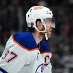 Apr 11, 2026; Los Angeles, California, USA; Edmonton Oilers center Connor McDavid (97) reacts against the Los Angeles Kings during the third period at Crypto.com Arena.