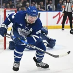 Feb 28, 2026; Toronto, Ontario, CAN; Toronto Maple Leafs defenseman Morgan Rielly (44) pursues the puck against the Ottawa Senators in the second period at Scotiabank Arena.