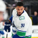 Mar 24, 2026; Vancouver, British Columbia, CAN; Vancouver Canucks forward Evander Kane (91) shoots against the Anaheim Ducks in the second period at Rogers Arena.