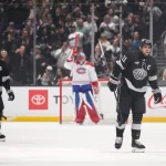 Mar 7, 2026; Los Angeles, California, USA; Los Angeles Kings center Anze Kopitar (11) skates back to the bench after scoring during the first period against the Montréal Canadiens at Crypto.com Arena.