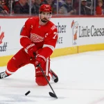 Apr 7, 2026; Detroit, Michigan, USA; Detroit Red Wings center Dylan Larkin (71) skates with the puck in the first period against the Columbus Blue Jackets at Little Caesars Arena.