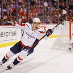 May 3, 2022; Sunrise, Florida, USA; Washington Capitals center Evgeny Kuznetsov (92) celebrates after scoring against Florida Panthers goaltender Sergei Bobrovsky (72) during the third period in game one of the first round of the 2022 Stanley Cup Playoffs at FLA Live Arena.