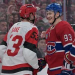 May 25, 2026; Montreal, Quebec, CAN; Carolina Hurricanes right wing Jackson Blake (53) and Montreal Canadiens right wing Ivan Demidov (93) react after a play during overtime in game three of the Eastern Conference Final of the 2026 Stanley Cup Playoffs at Bell Centre.