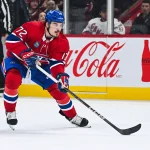 Feb 25, 2025; Montreal, Quebec, CAN; Montreal Canadiens defenseman Arber Xhekaj (72) plays the puck against the Carolina Hurricanes in the first period at Bell Centre.
