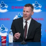 Jun 4, 2026; Vancouver, BC, CANADA; General manager Ryan Johnson speaks in a press conference where the Vancouver Canucks introduce Manny Malhotra as their new head coach at Rogers Arena.