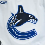 Jan 12, 2026; Montreal, Quebec, CAN; View of a Vancouver Canucks logo on a jersey worn by a member of the team during the second period at Bell Centre.