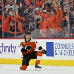 Apr 22, 2026; Philadelphia, Pennsylvania, USA; Philadelphia Flyers center Trevor Zegras (46) celebrates his goal against the Pittsburgh Penguins during the second period in game three of the first round of the 2026 Stanley Cup Playoffs at Xfinity Mobile Arena.