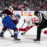 Red Wings make their Dylan Larkin trade demand clear as four teams hesitate Mar 25, 2025; Denver, Colorado, USA; Colorado Avalanche center Nathan MacKinnon (29) and Detroit Red Wings center Dylan Larkin (71) prepare to take a face off in the third period at Ball Arena. Mandatory Credit: Ron Chenoy-Imagn Images