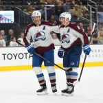 Oct 9, 2024; Las Vegas, Nevada, USA; Colorado Avalanche right wing Mikko Rantanen (96) celebrates with defenseman Cale Makar (8) after scoring a goal against the Vegas Golden Knights during the third period at T-Mobile Arena.