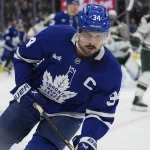 Jan 19, 2026; Toronto, Ontario, CAN; Toronto Maple Leafs forward Auston Matthews (34) skates against the Minnesota Wild during the first period at Scotiabank Arena.