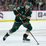 May 11, 2026; Saint Paul, Minnesota, USA; Minnesota Wild defenseman Quinn Hughes (43) skates with the puck against the Colorado Avalanche during the second period in game four of the second round of the 2026 Stanley Cup Playoffs at Grand Casino Arena.