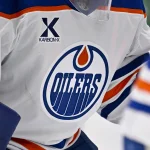 Mar 12, 2026; Dallas, Texas, USA; A view of the logo on the jersey of Edmonton Oilers goaltender Tristan Jarry (35) during the game between the Stars and the Oilers at the American Airlines Center.