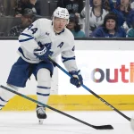 Apr 2, 2026; San Jose, California, USA; Toronto Maple Leafs defenseman Morgan Rielly (44) looks to pass the puck during the first period against the San Jose Sharks at SAP Center at San Jose.