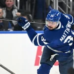 Mar 7, 2026; Toronto, Ontario, CAN; Toronto Maple Leafs forward Auston Matthews (34) shoots the puck against the Tampa Bay Lightning in the third period at Scotiabank Arena.