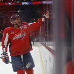 Feb 23, 2025; Washington, District of Columbia, USA; Washington Capitals left wing Alex Ovechkin (8) celebrates with his son Sergei (not pictured) after the Capitals game against the Edmonton Oilers at Capital One Arena.